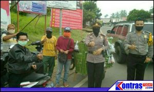 Cegah Penyebaran Covid-19, Polsek Lais Bagikan Masker Kepada Pengguna Jalan dan Pedagang